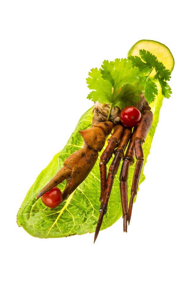 Crab legs on white background photo
