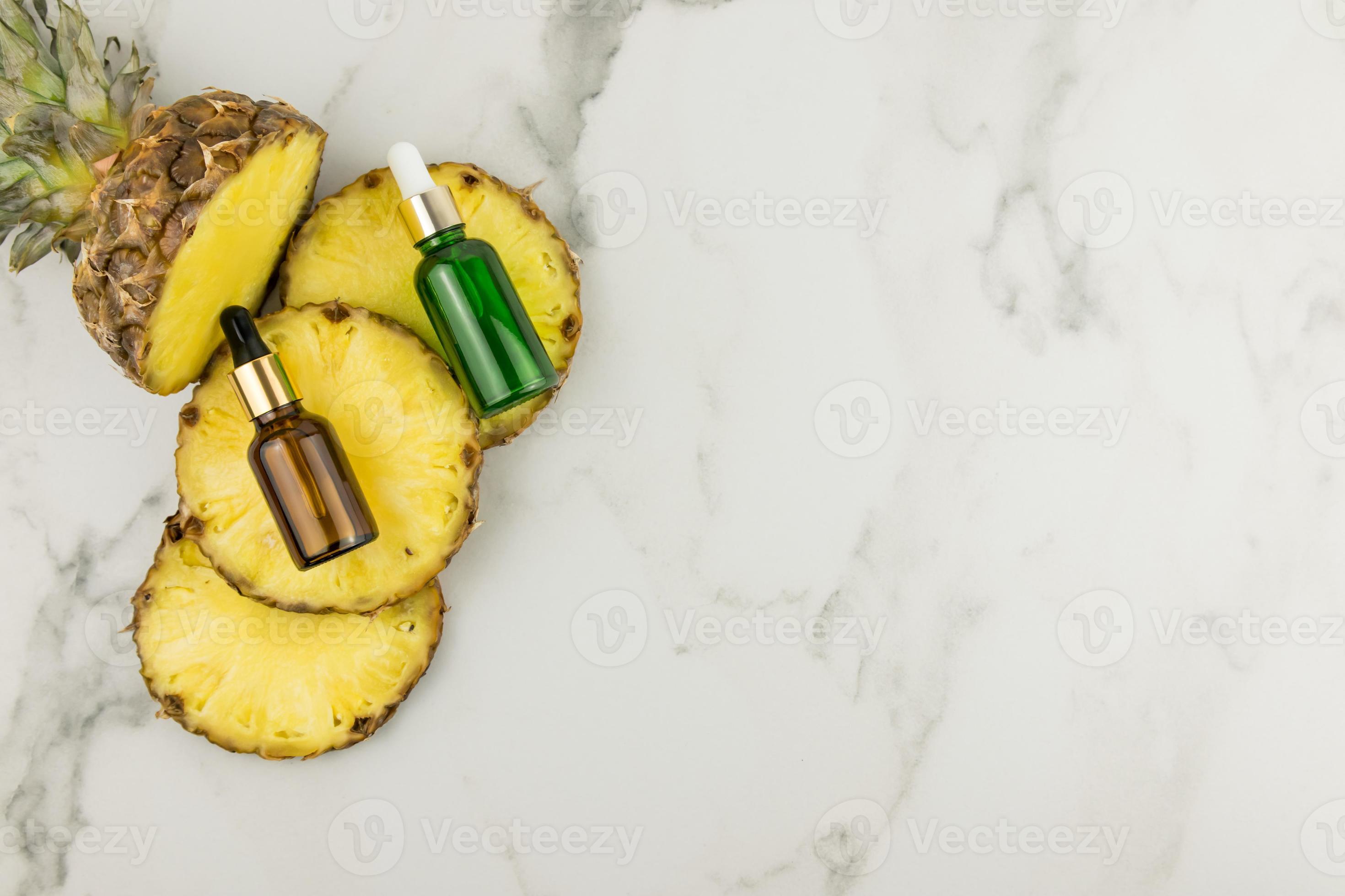 brightening, whitening serum with pineapple extract in cosmetic bottles