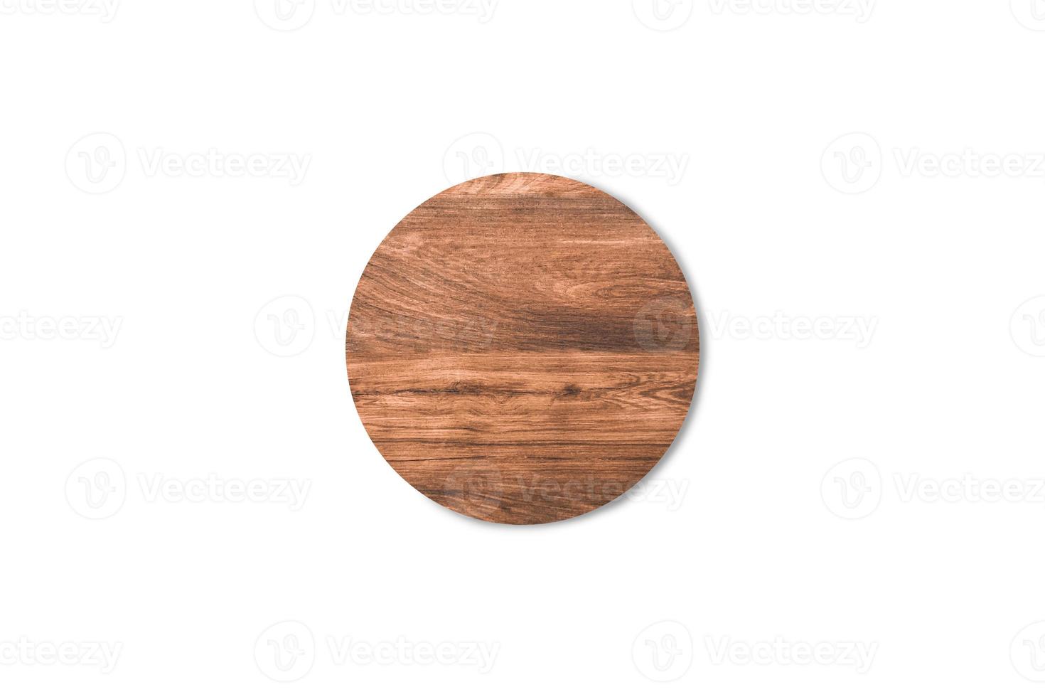 Empty round wooden cutting board isolated on white background with clipping path for work or design photo