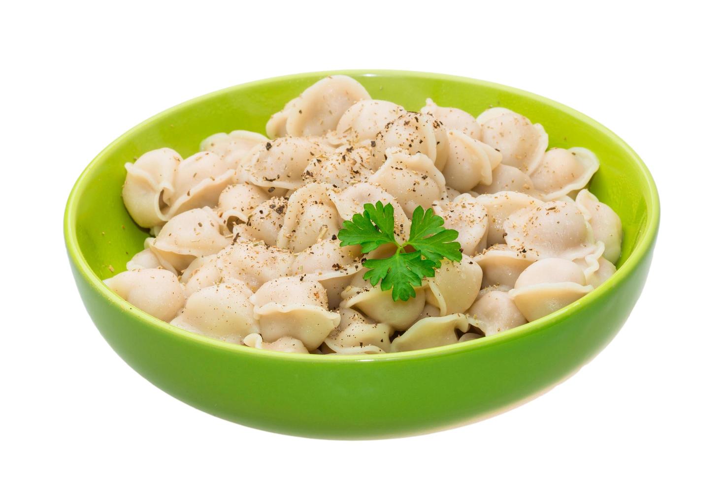 Russian dumplings in a bowl on white background photo