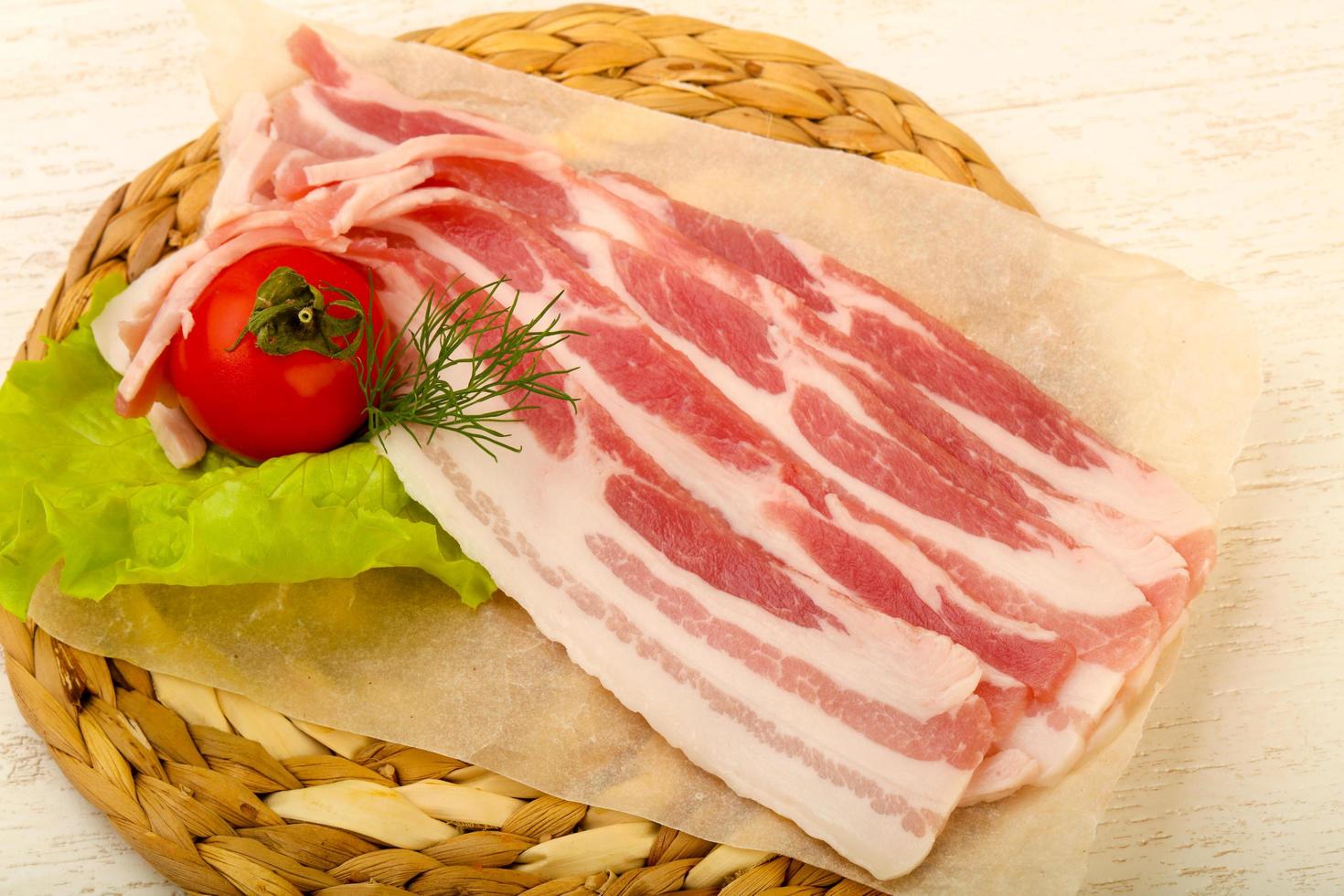 Raw bacon dish view photo