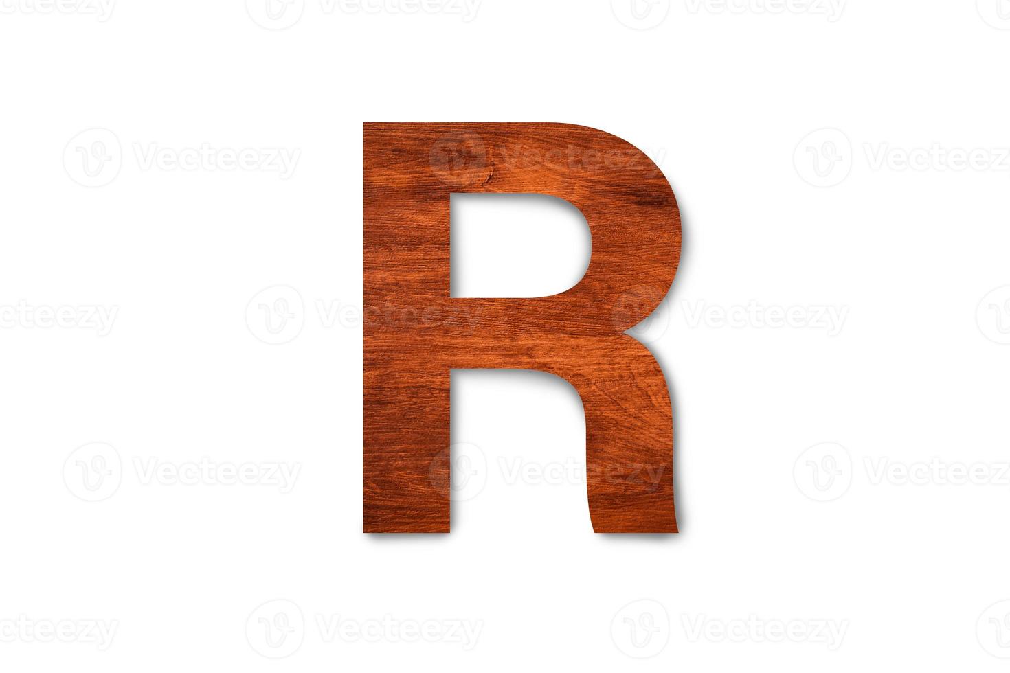Modern wooden alphabet letter R isolated on white background with clipping path for design photo
