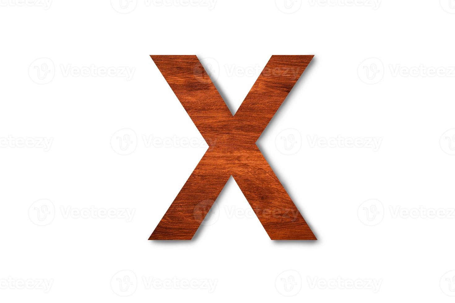 Modern wooden alphabet letter X isolated on white background with clipping path for design photo