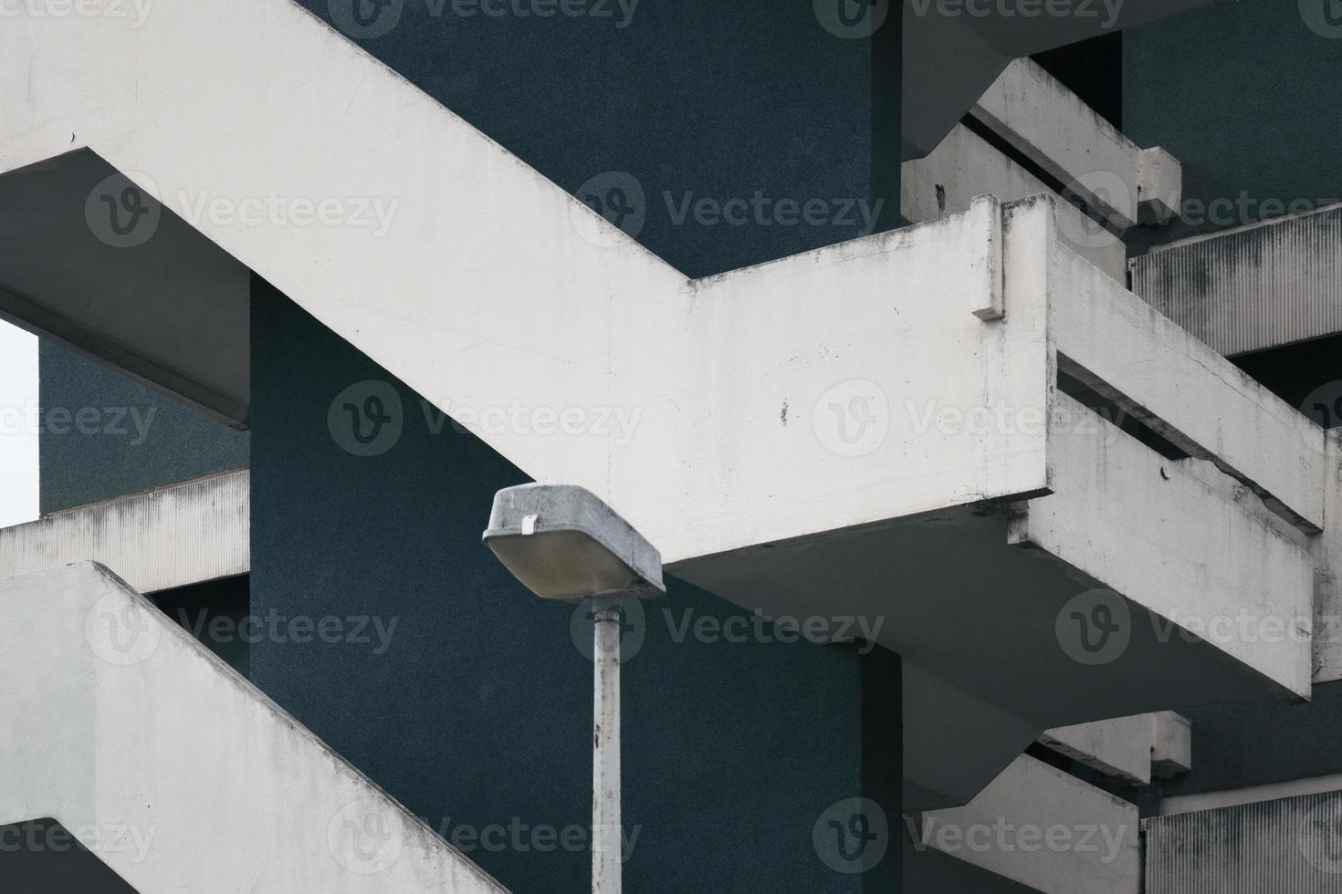 Architectural lines, flat building facade repetition background, architecture art, stairs geometry outdoor, minimal shape 3d geometric staircase, downward stairway, simplicity urban construction. photo