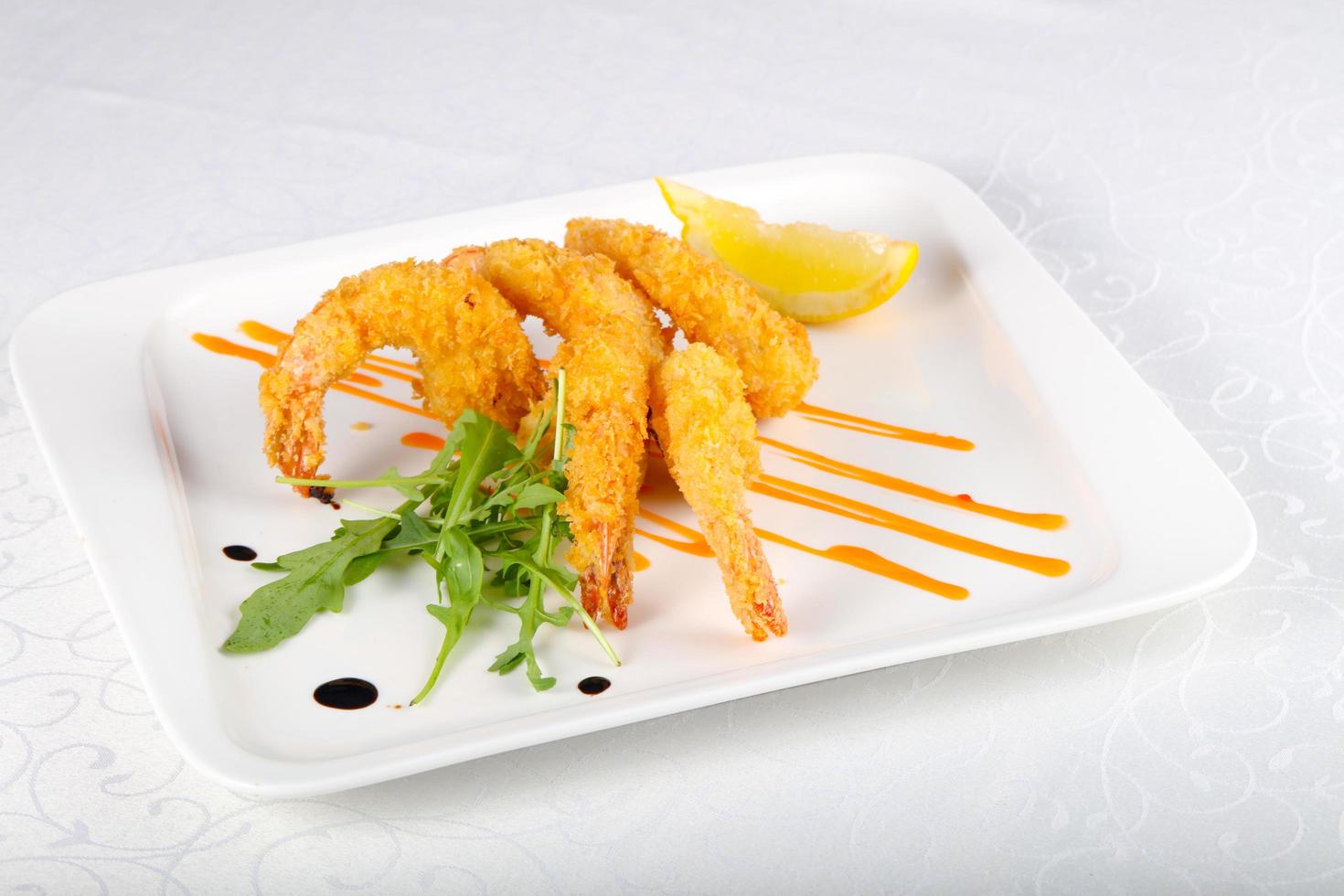 Crispy prawns dish view photo