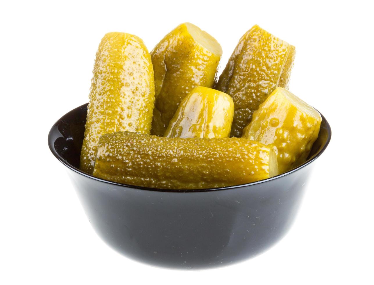 Marinaded cucumber on white photo