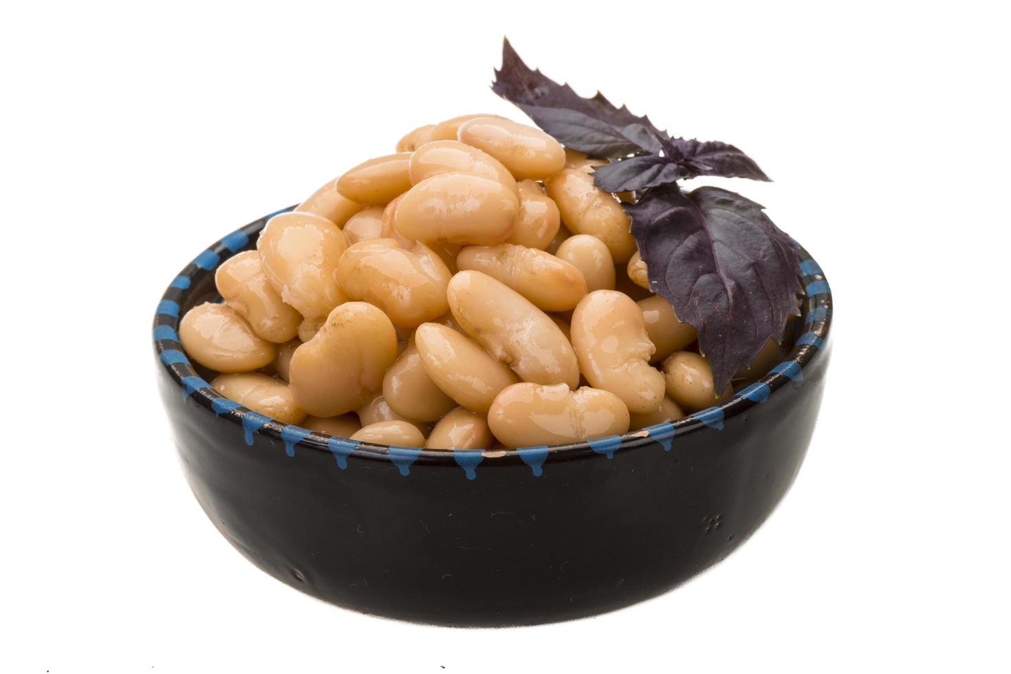 Tinned bean in a bowl on white background photo