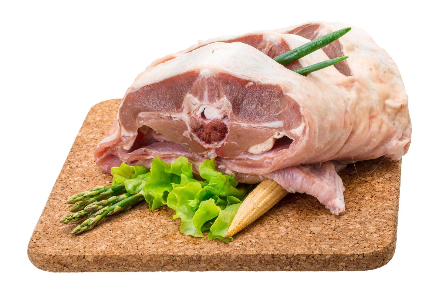 Raw lamb on white photo