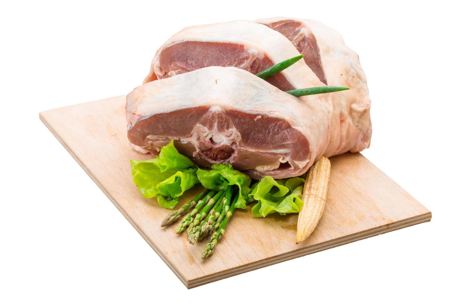 Raw lamb on white photo