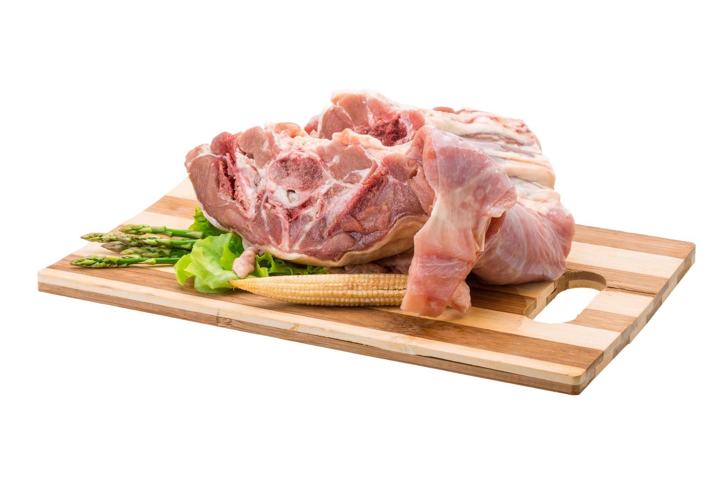 Raw lamb on white photo