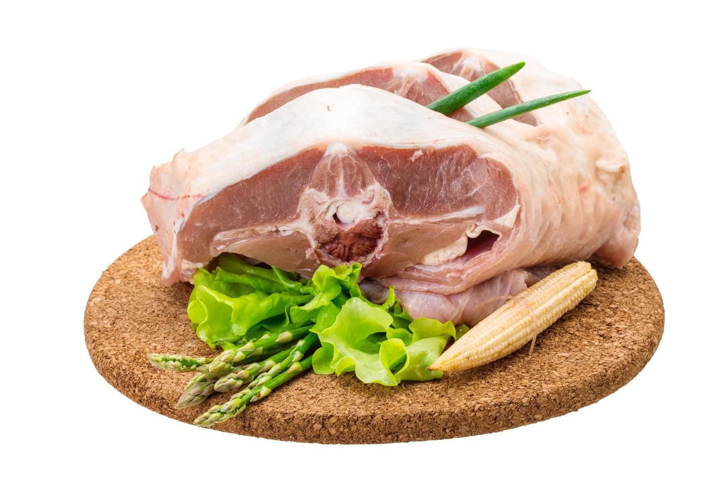 Raw lamb on white photo