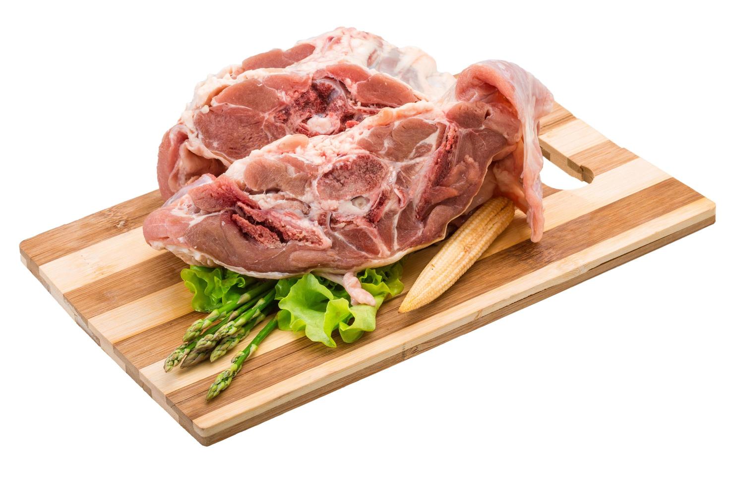 Raw lamb on white photo