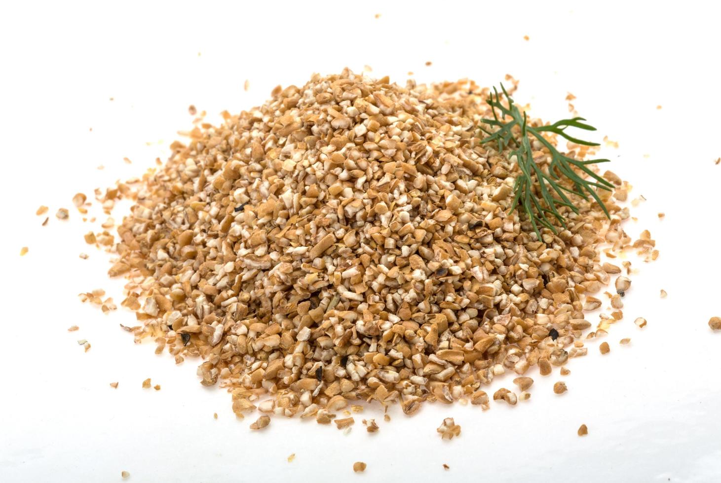 Pearl barley on white photo