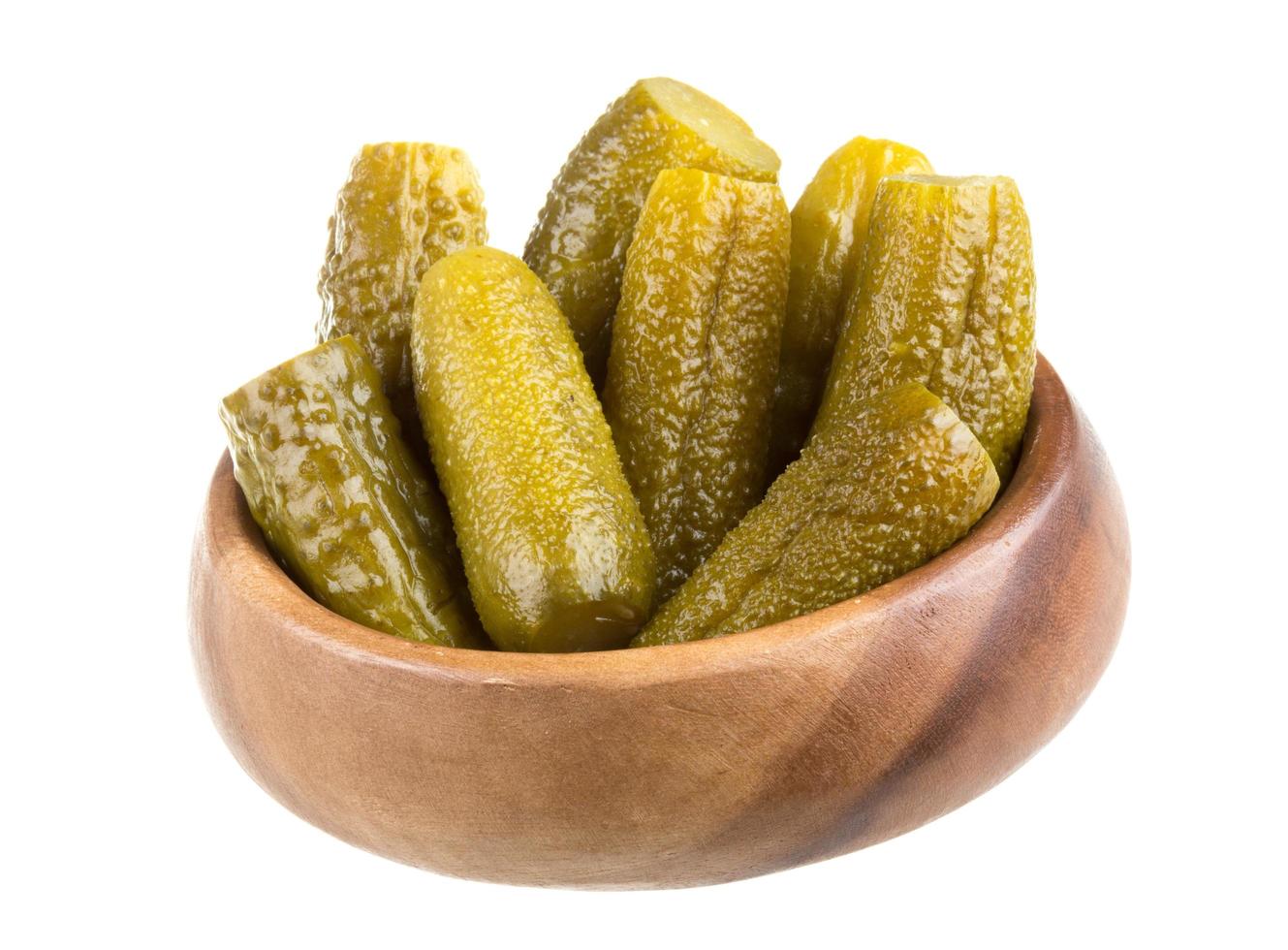 Marinaded cucumber on white photo