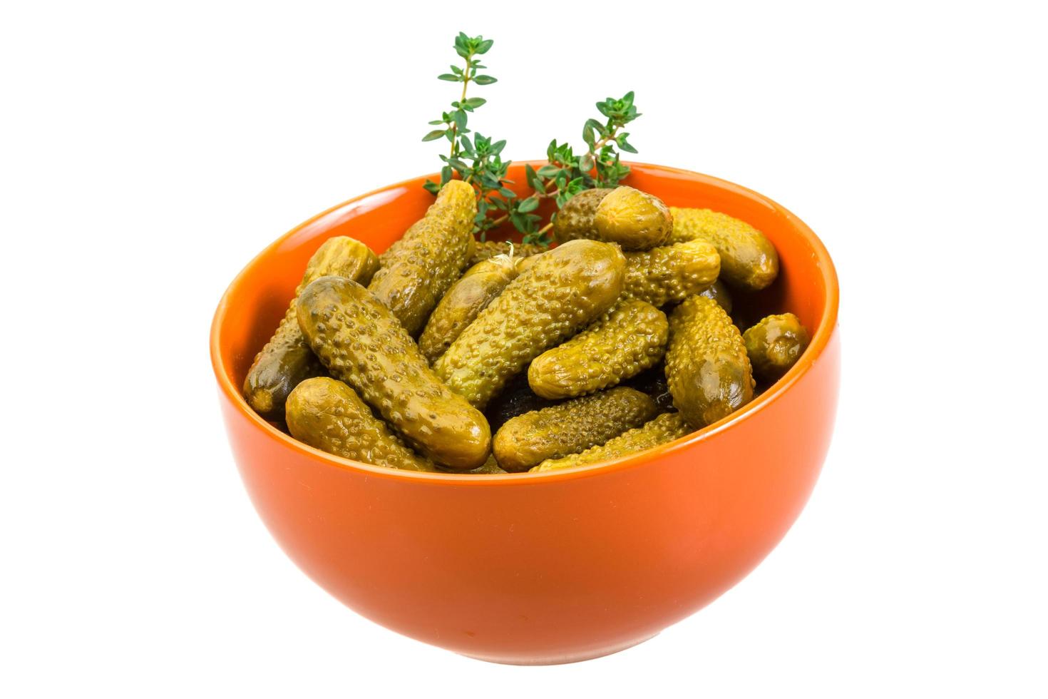 Marinated cucumbers on white photo
