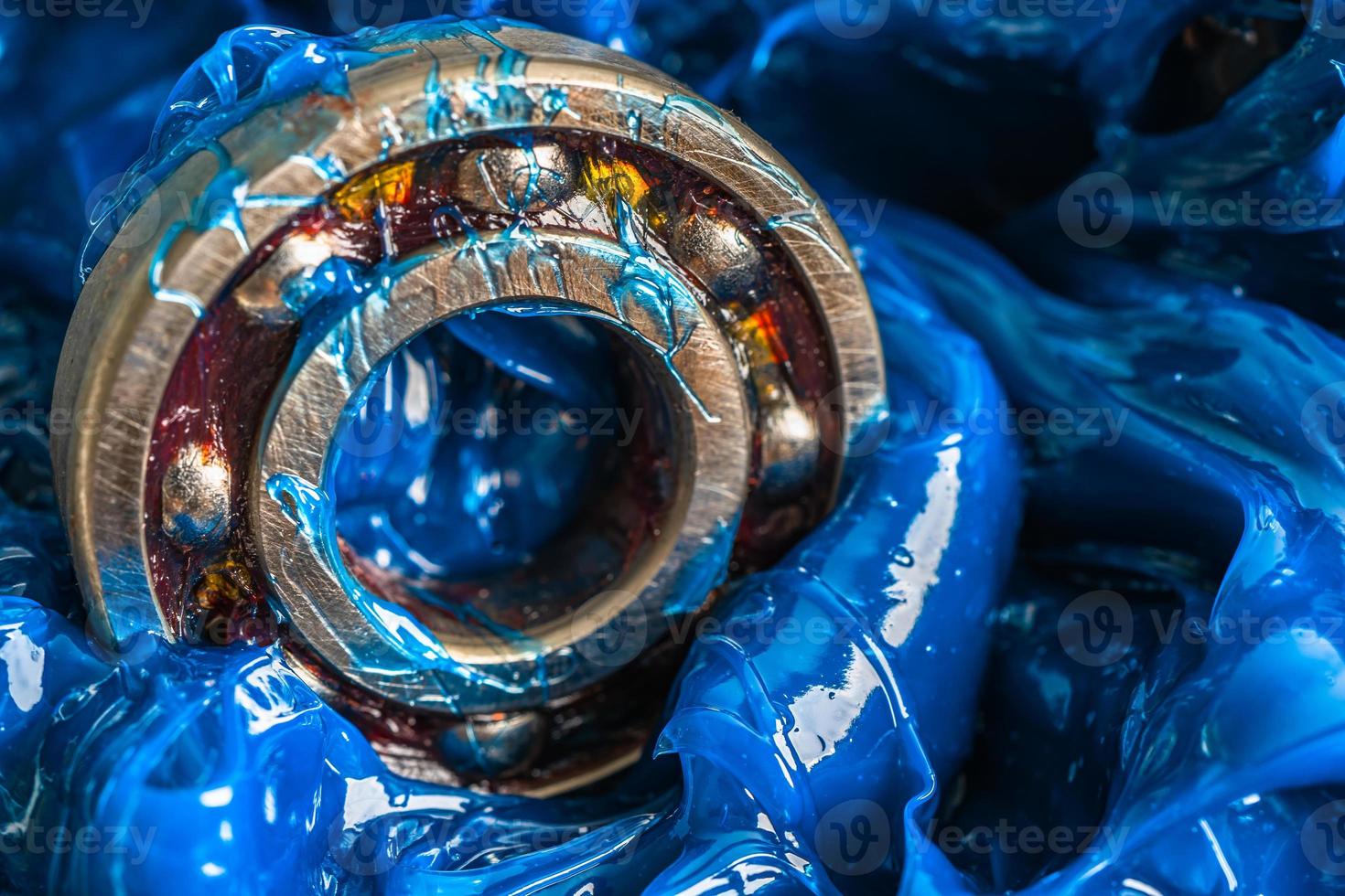 Ball bearing stainless with blue premium quality synthetic lithium complex grease, high temperatures and machinery lubrication for automotive and industrial. photo