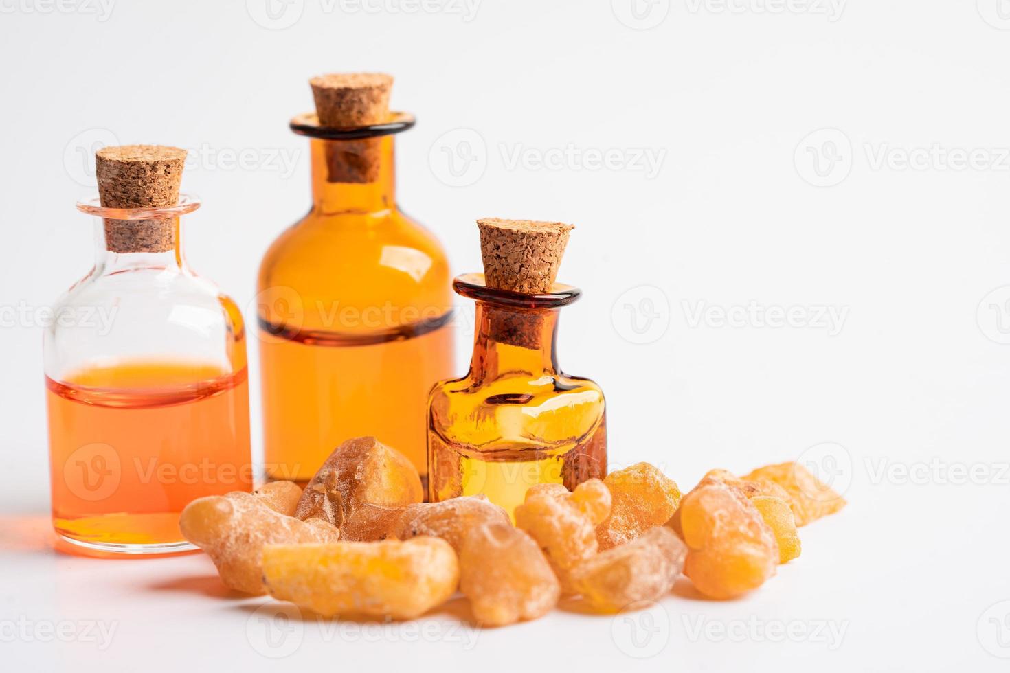 Frankincense or olibanum aromatic resin isolated on white background used in incense and perfumes. photo