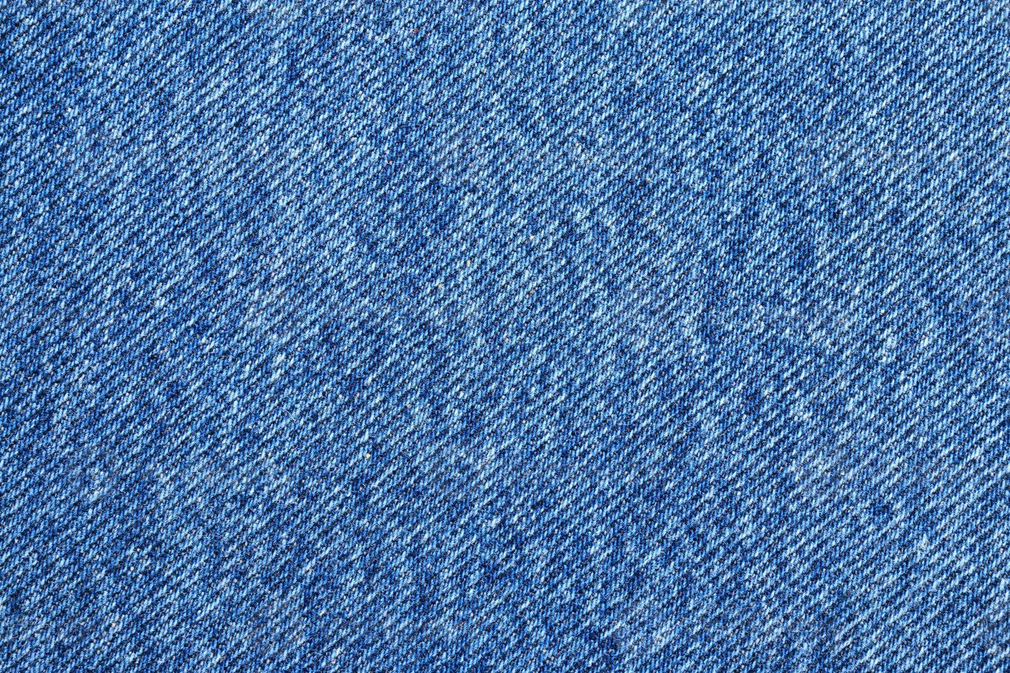 Denim blue jeans texture close up background top view photo