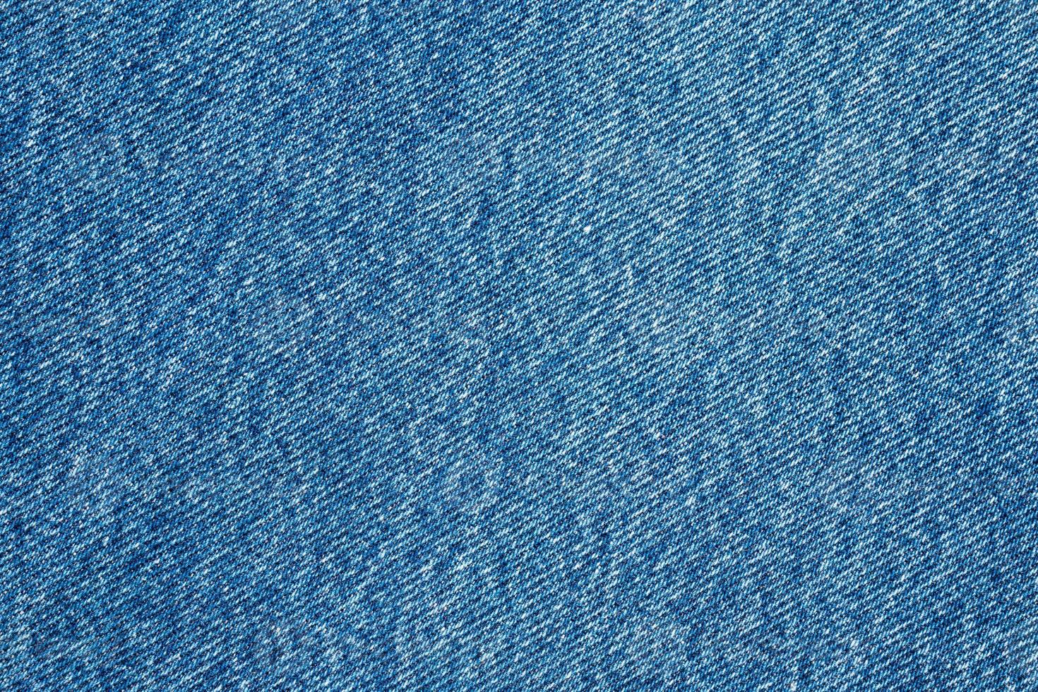 Denim blue jeans texture close up background top view photo