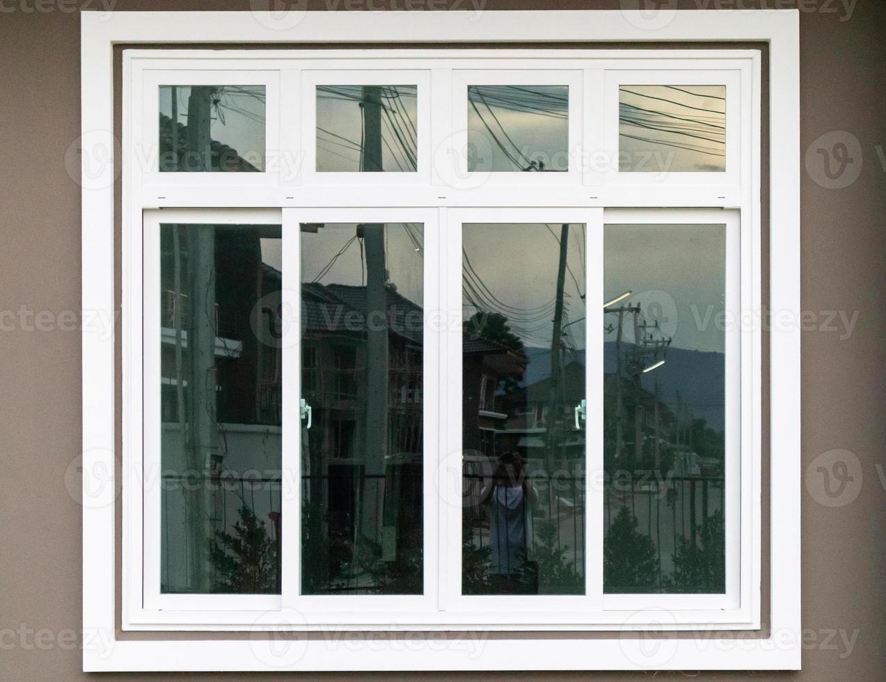 Modern window frame outside the house photo