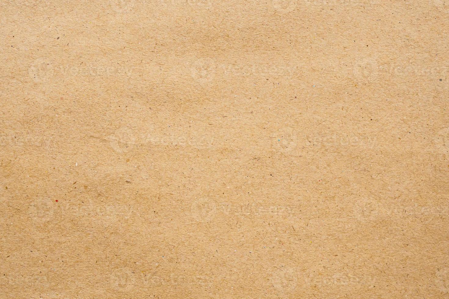 Brown eco recycled kraft paper sheet texture cardboard background photo