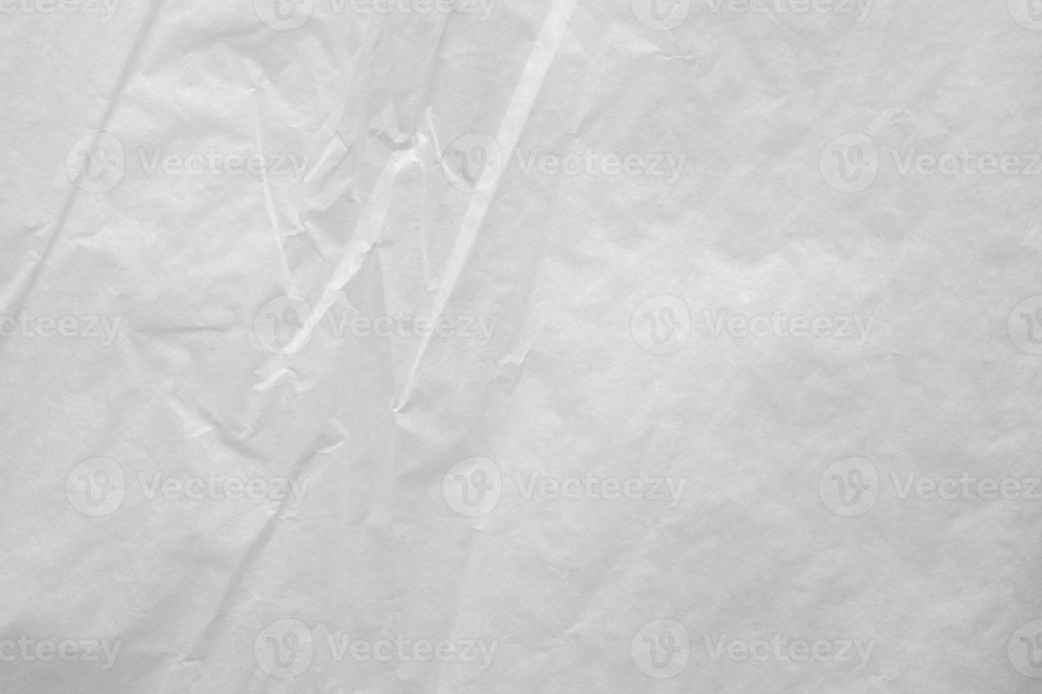 White crumpled paper abstract background texture photo