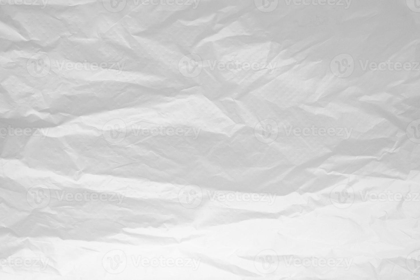 White crumpled paper abstract background texture photo