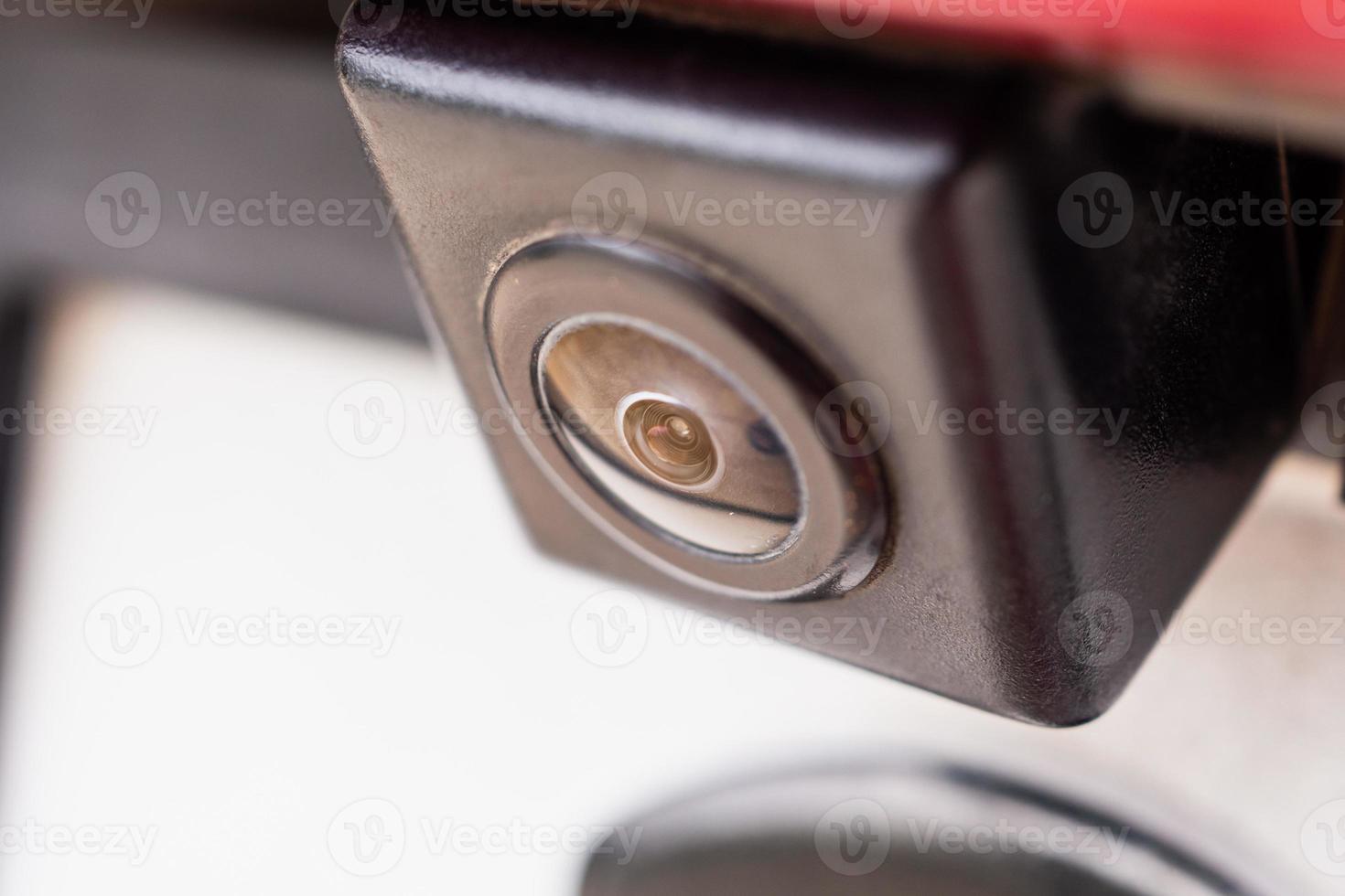 Red car rear view camera close up for parking assistance photo