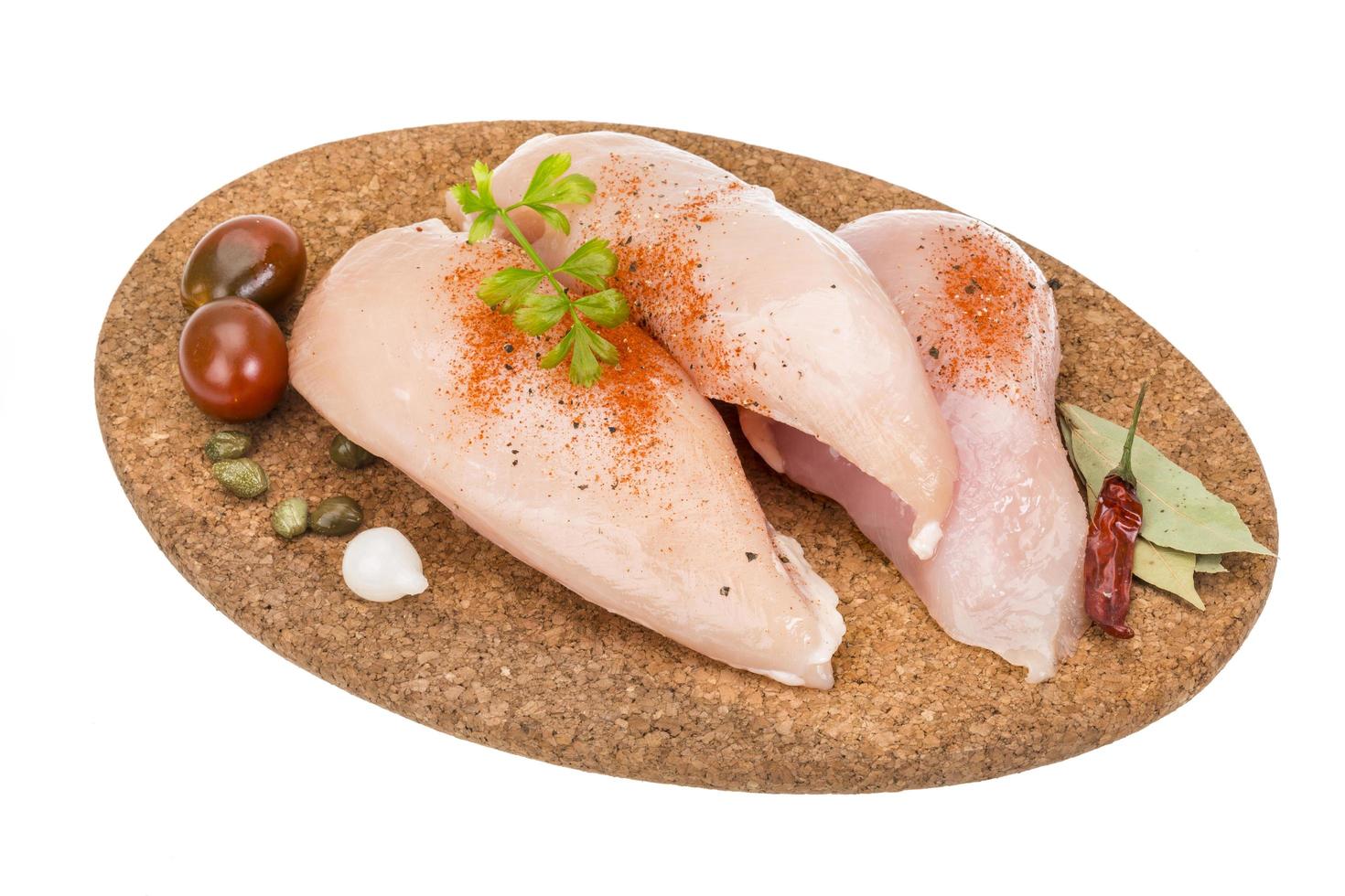 Chicken pile on white photo