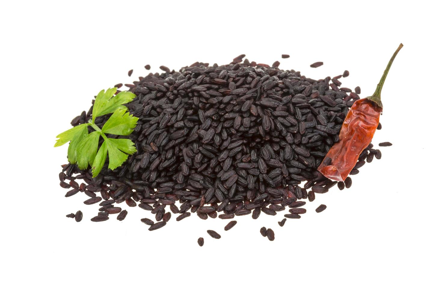 Black rice on white photo