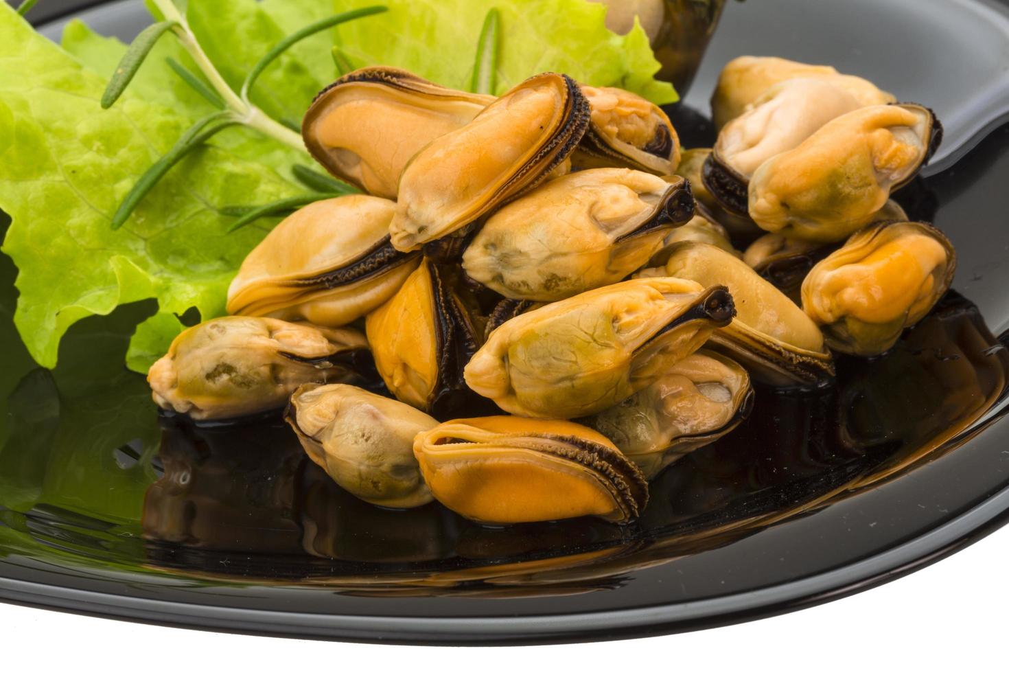 Marinated mussels on white 12886008 Stock Photo at Vecteezy