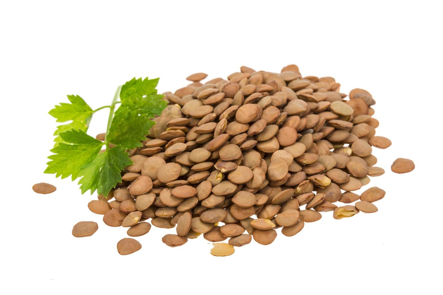 Isolated lentils on white photo
