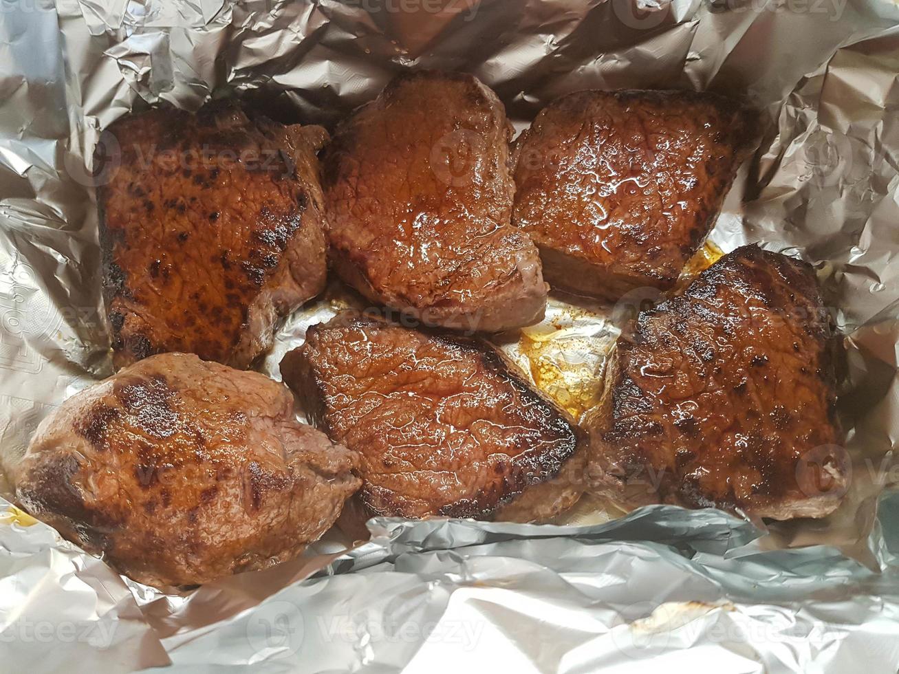 a filet of a beef Steak with herbs and spices photo
