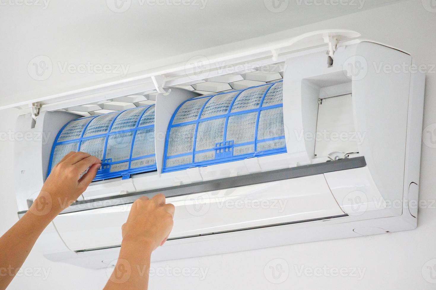 man hand hold air conditioner filter cleaning concept photo