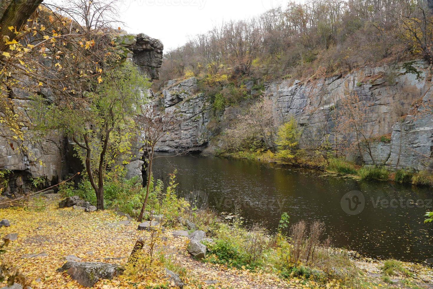 Granite rocks of Bukski Canyon with the Girskyi Tikych River. Picturesque landscape and beautiful place in Ukraine photo