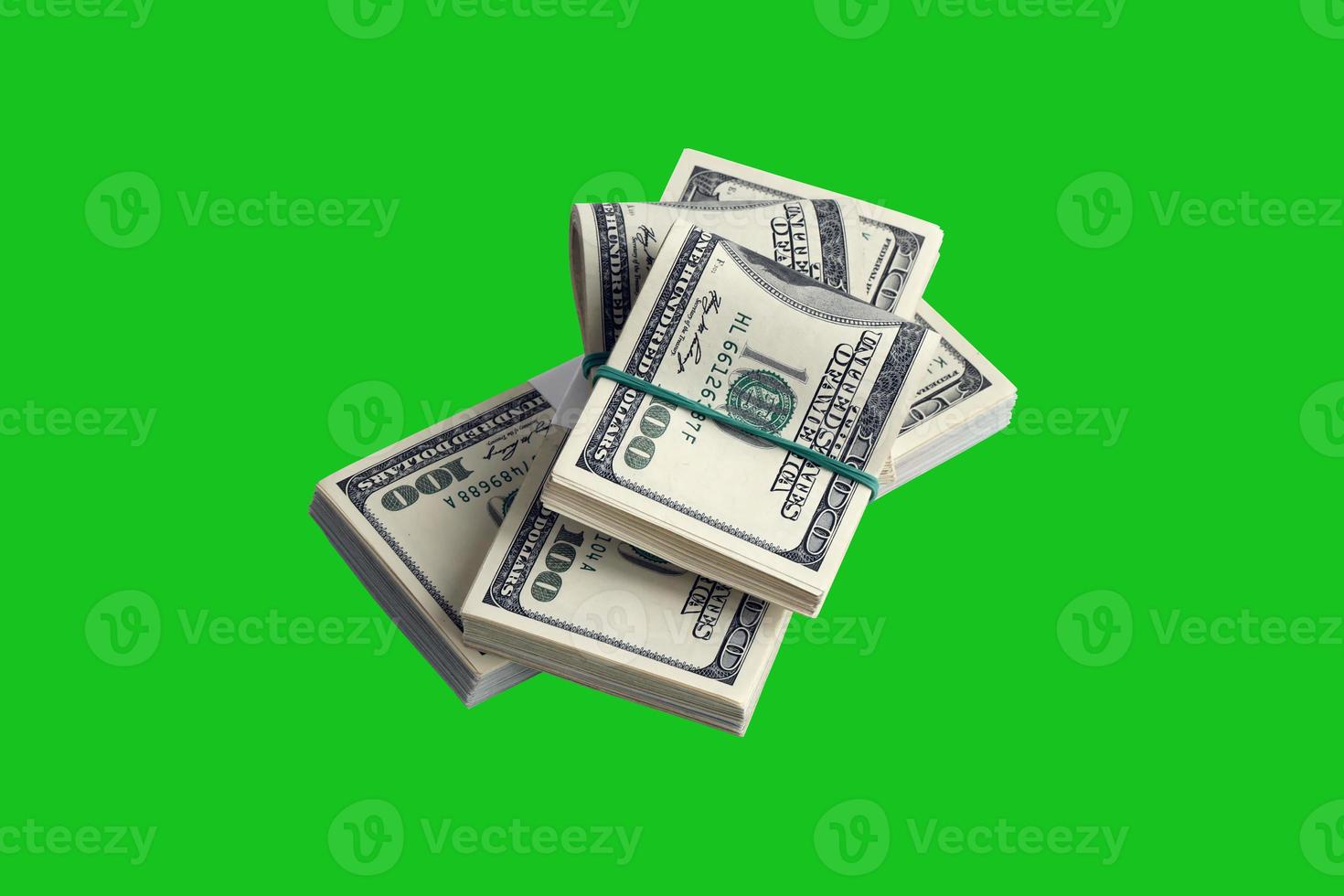 Bundle of US dollar bills isolated on chroma keyer green. Pack of american money with high resolution on perfect green mask photo