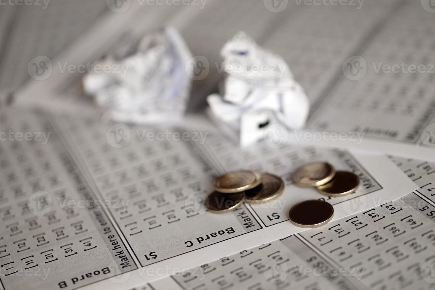 Crumpled lottery tickets as symbol of losing the lottery game. Unlucky gambling results. Misfortune photo