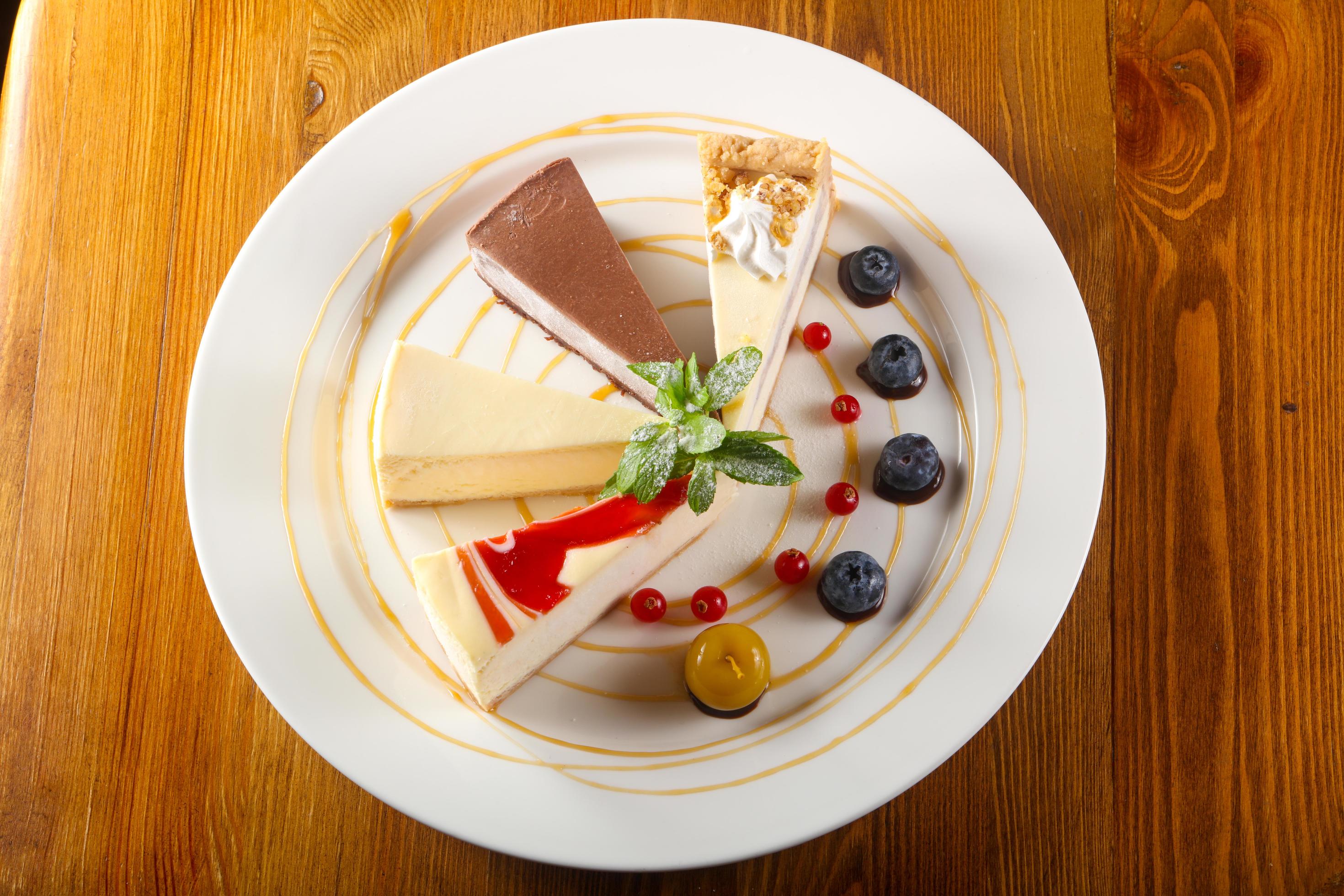 Cheesecake assortment view 12888590 Stock Photo at Vecteezy