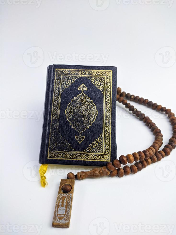 Islamic concept - The Holy Al Quran, on white background, with copy space photo