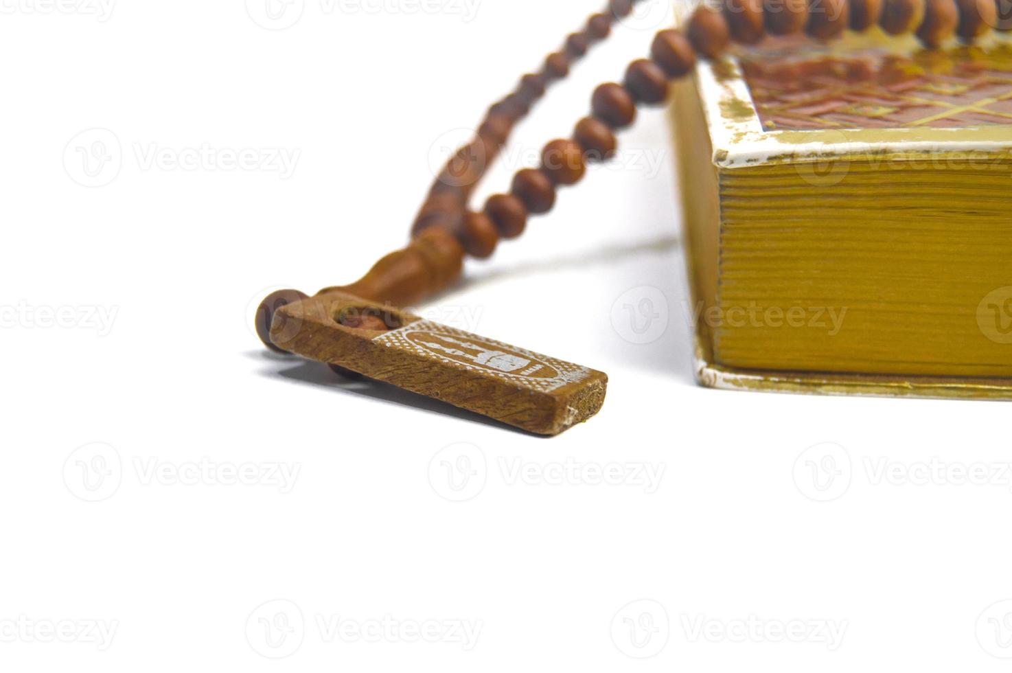 Islamic concept - The Holy Al Quran, on white background, with copy space photo