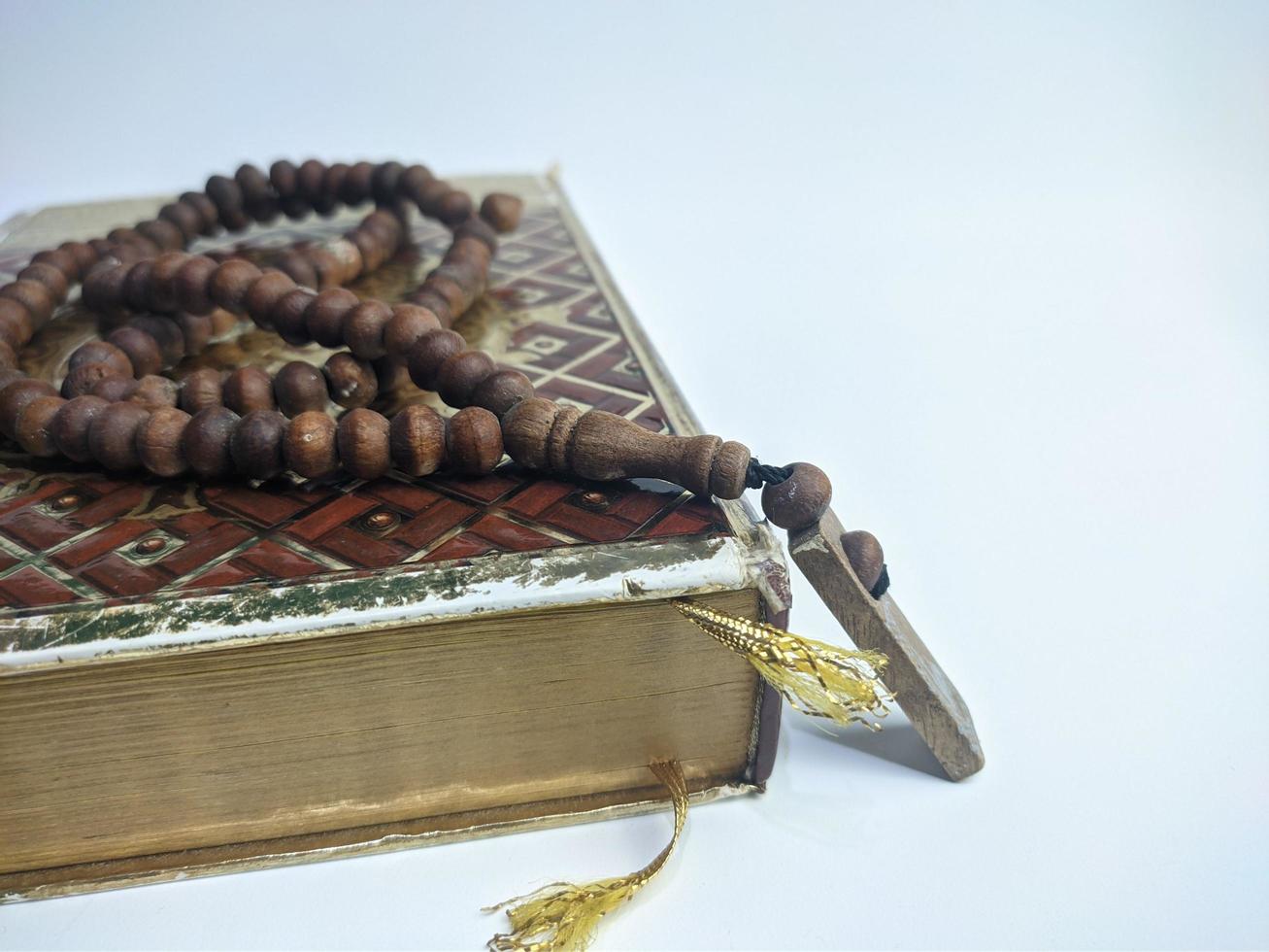 Islamic concept - The Holy Al Quran, on white background, with copy space photo