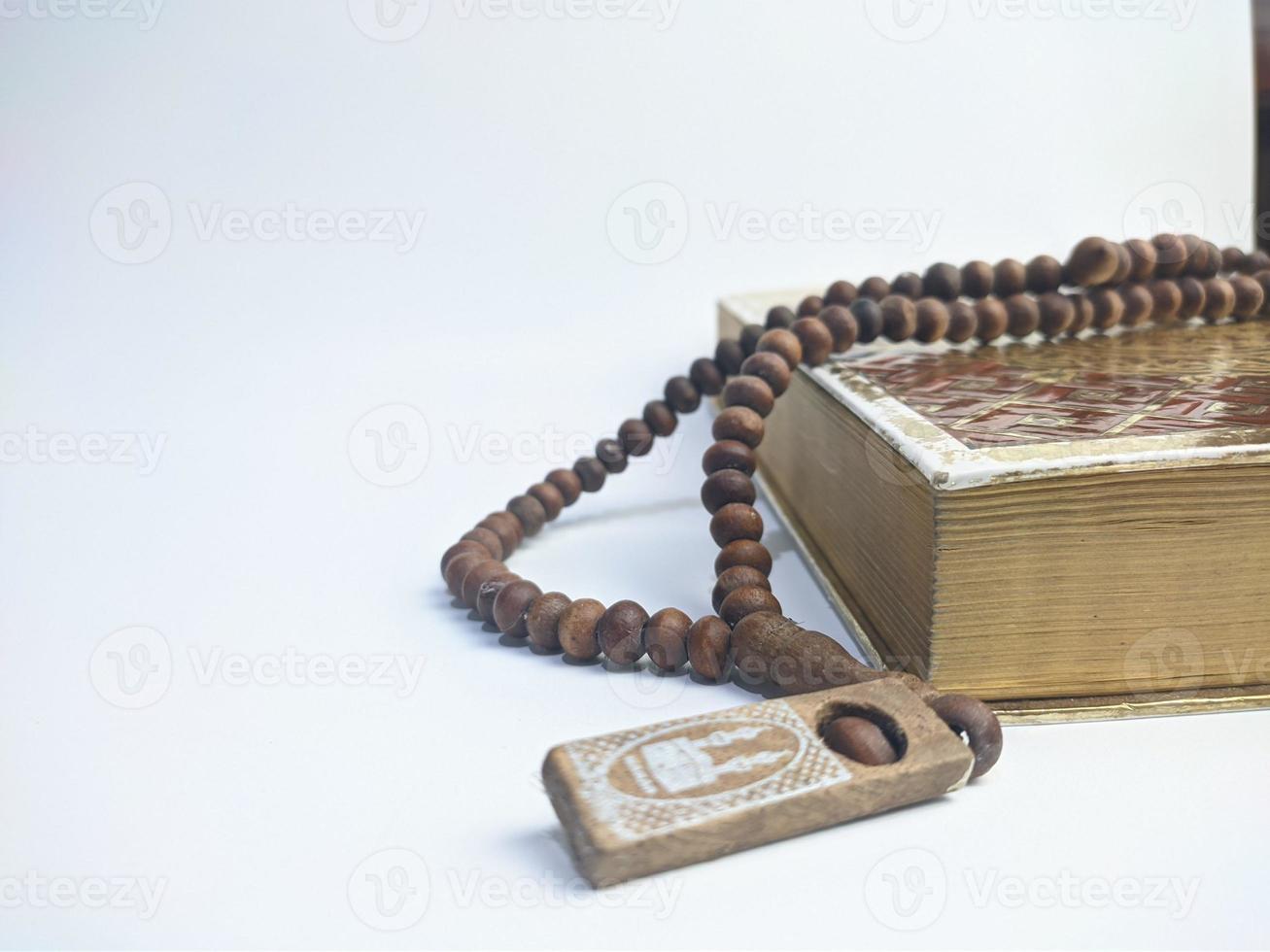 Islamic concept - The Holy Al Quran, on white background, with copy space photo