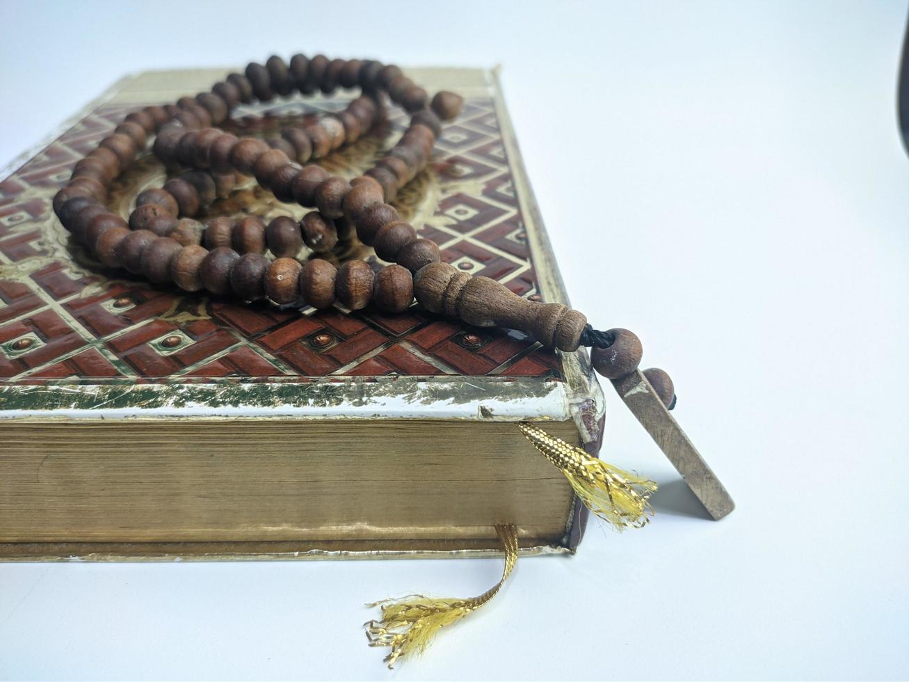 Islamic concept - The Holy Al Quran, on white background, with copy space photo