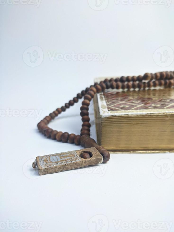 Islamic concept - The Holy Al Quran, on white background, with copy space photo