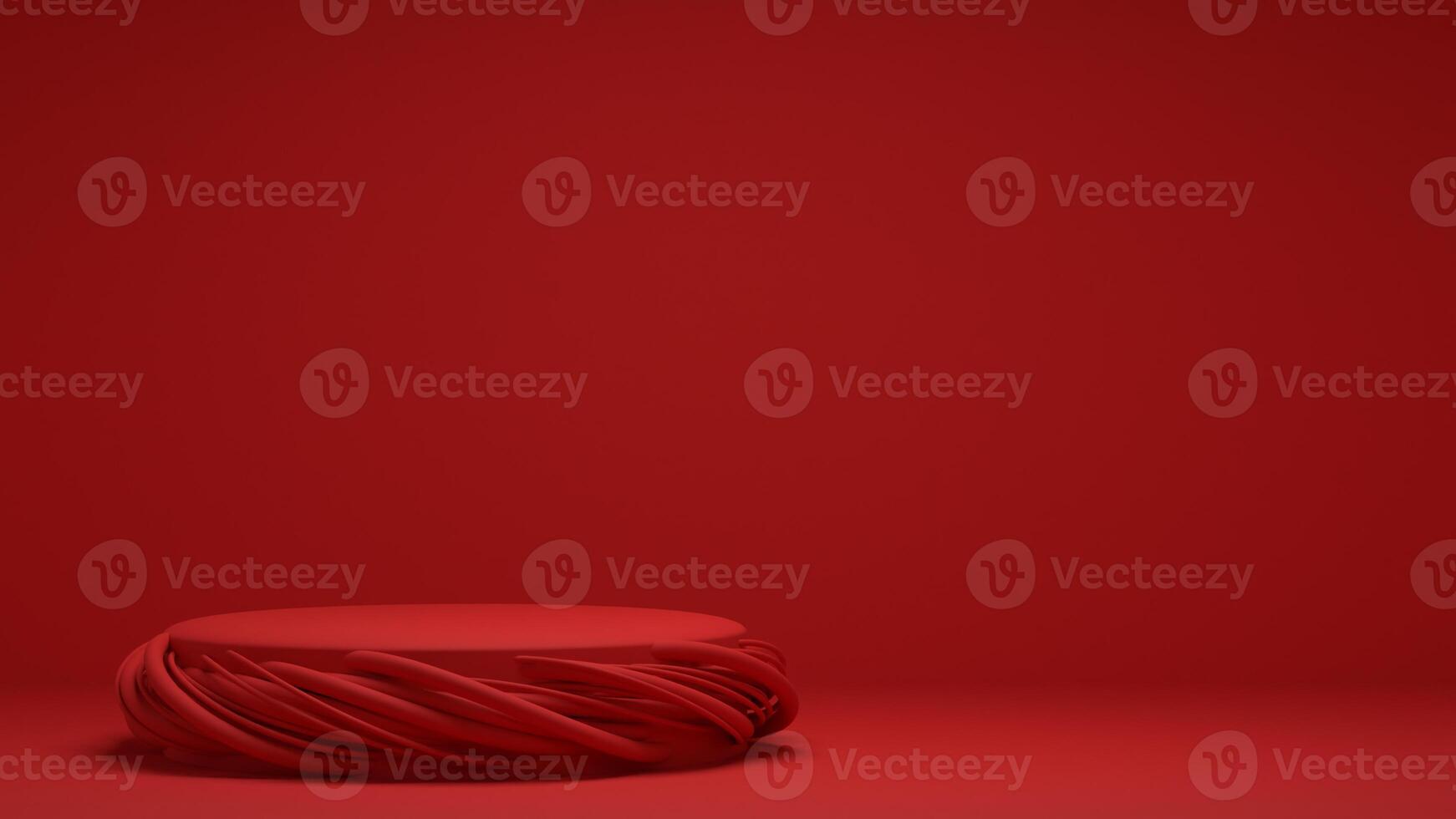 A red round object sitting on a red surface photo