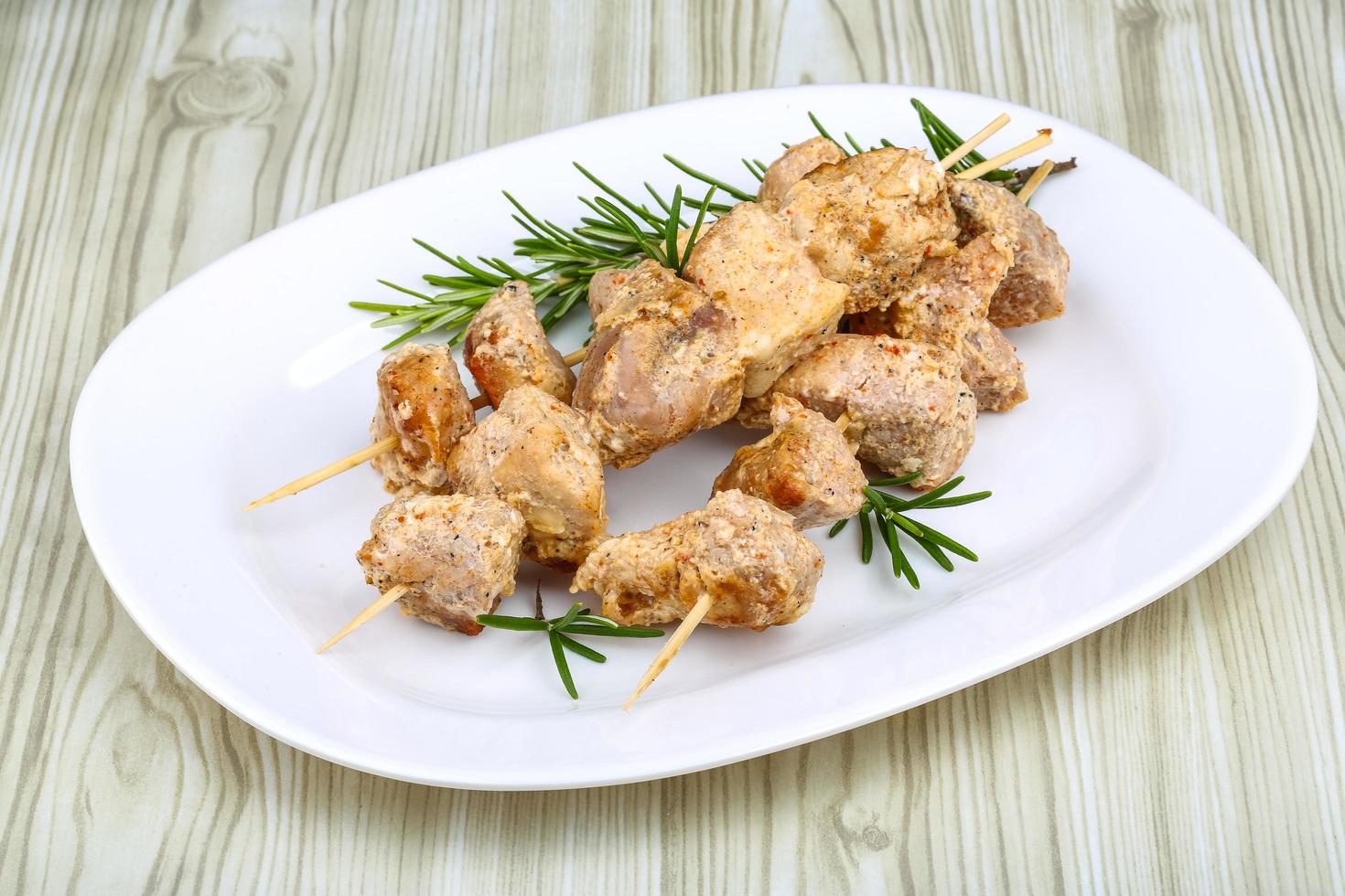 Chicken skewers dish view photo