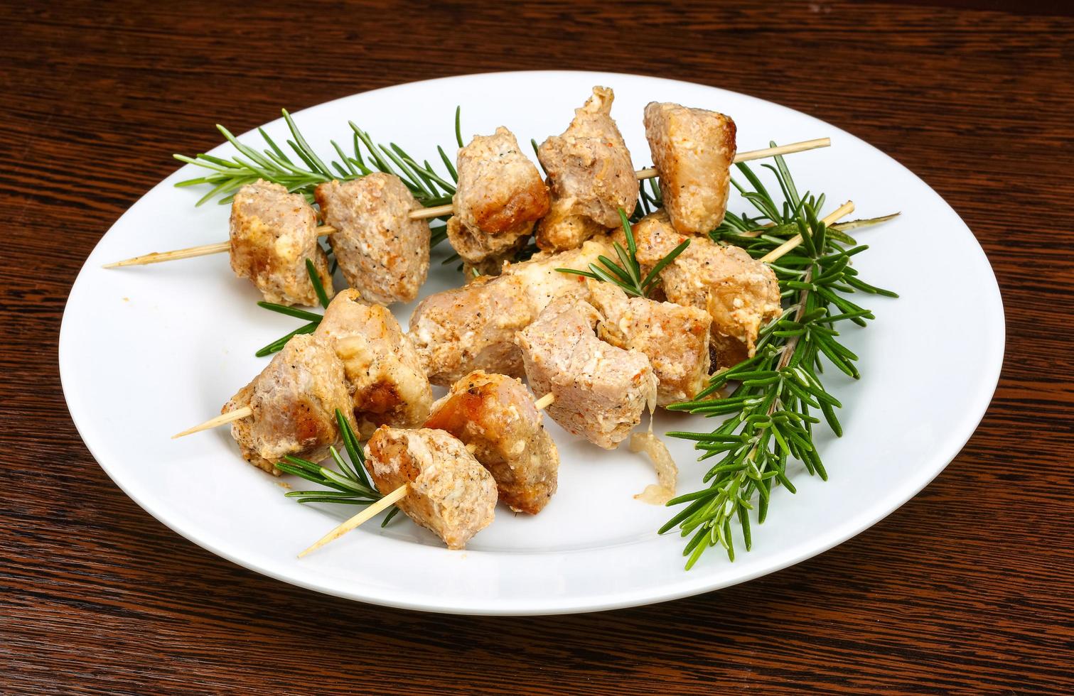 Chicken skewers dish view photo