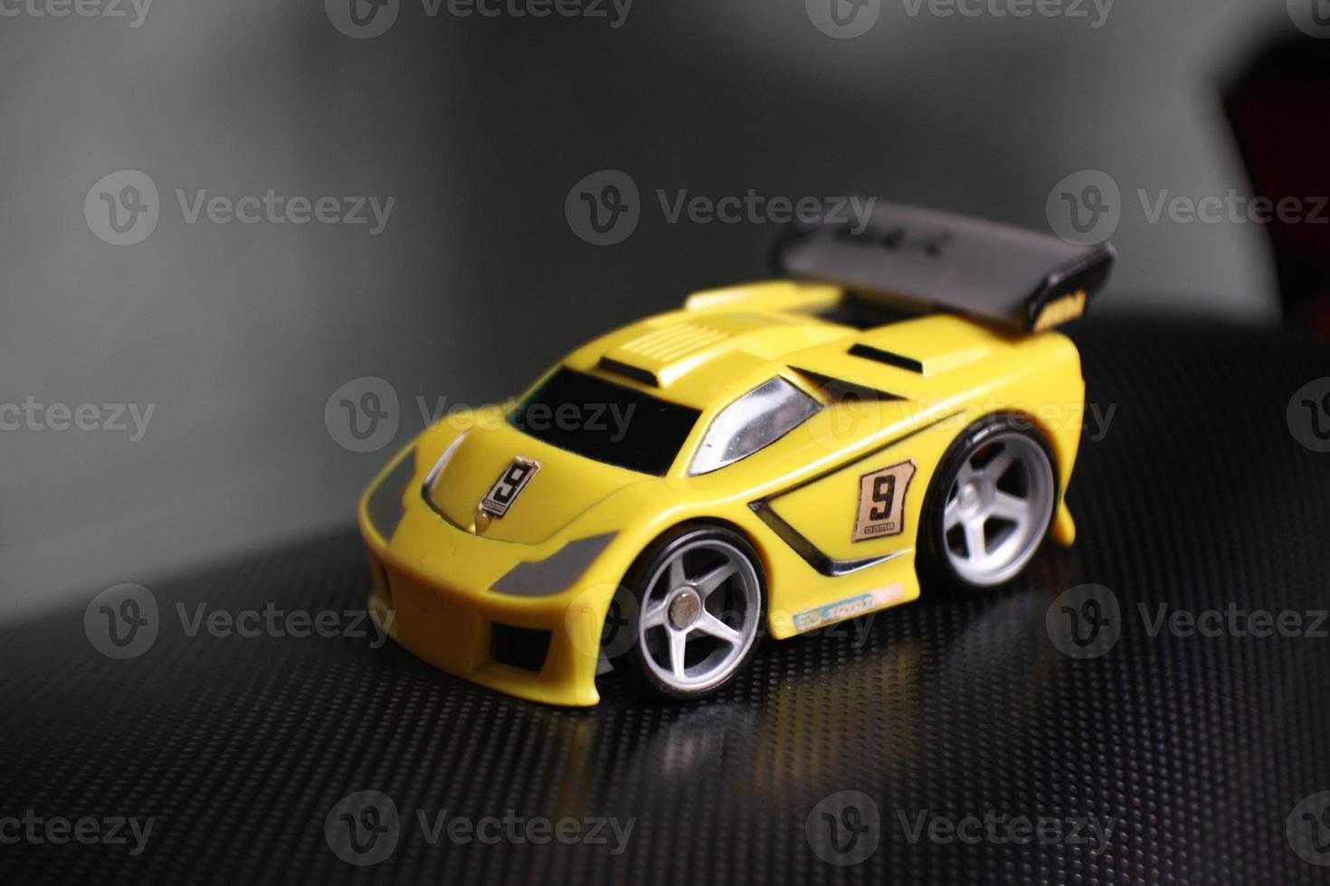 photo of a yellow car toy for boys