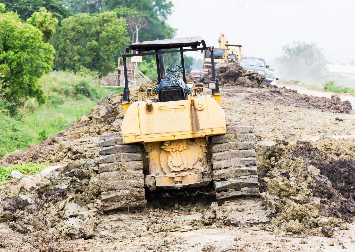 Bulldozer in construction site photo