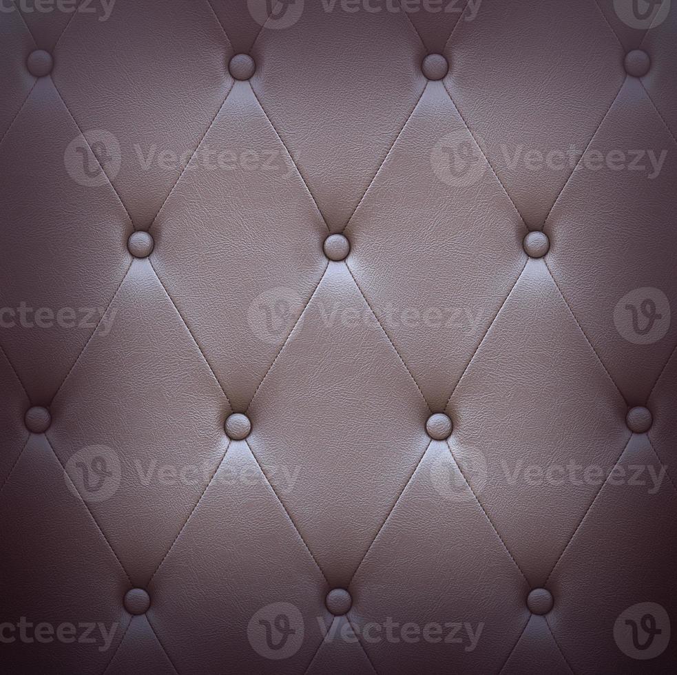 Pattern of brown leather seat upholstery photo